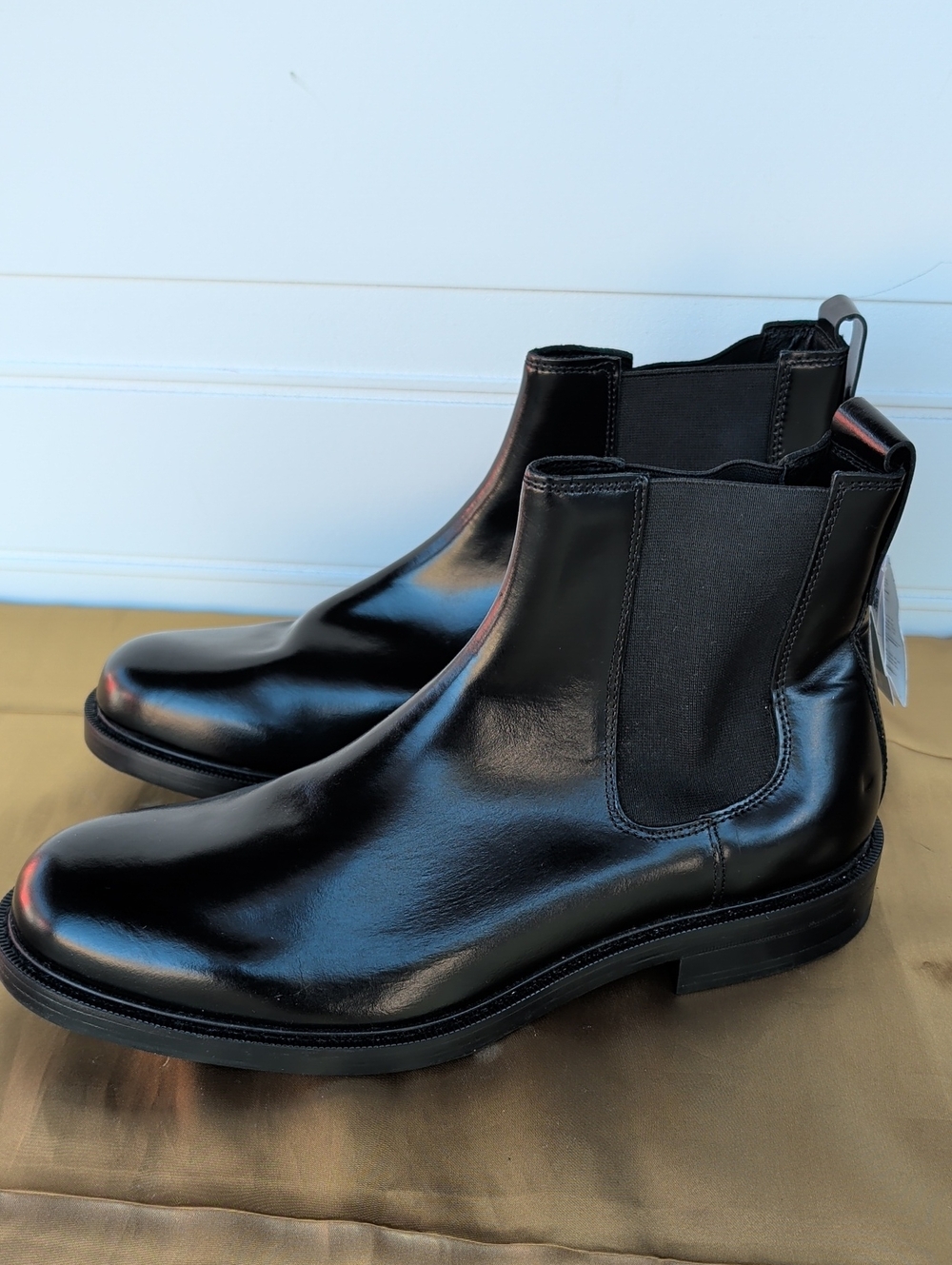Chelsea style Black boots. Smooth upper.  two side elastic panels New, Size 10